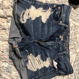 Blue distressed American eagle shorts